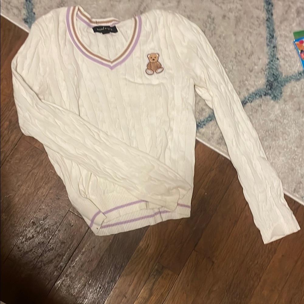 White Sweater with Bear Patch and Purple Trim